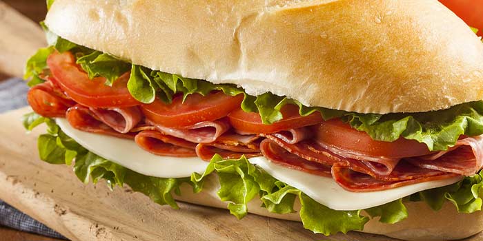Catered Italian style party sandwiches piled high with fresh deli meats and sliced cheese then delivered by the best catering in Idaho at Chicago Connection in Eagle
